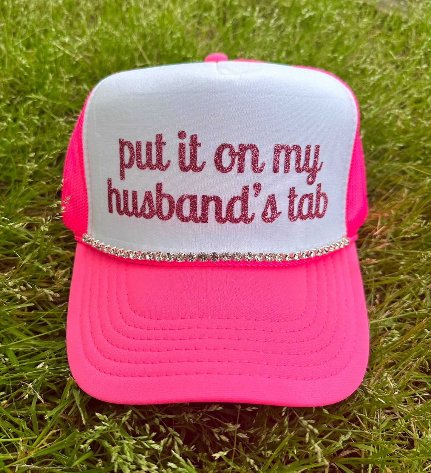 Put It On My Husband's Tab Trucker Hat: Neon Pink