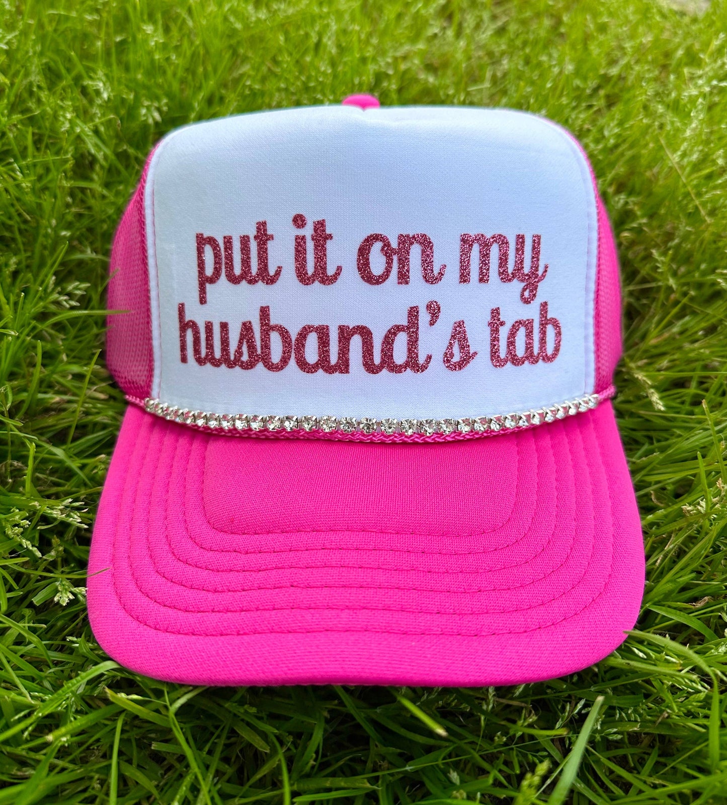 Put It On My Husband's Tab Trucker Hat: Neon Pink